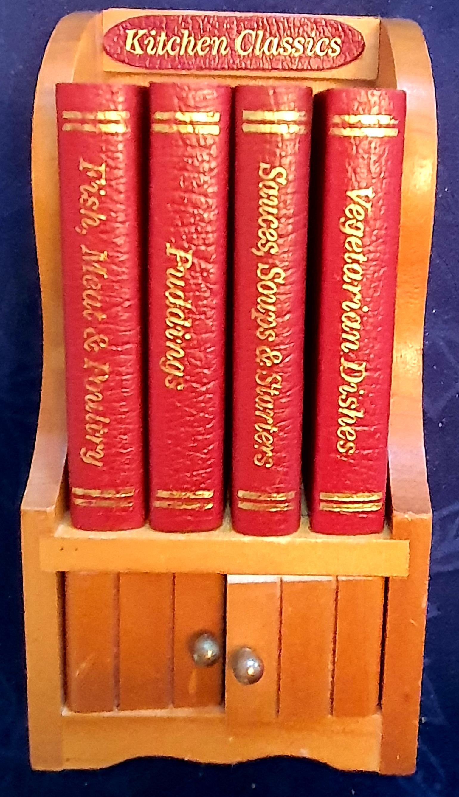 Image for "Kitchen Classics" - 4 volume miniature set in wooden book case. Sauces Soups & Starters; Vegetarian Dishes; Puddings; Fish, Meat & Poultry.